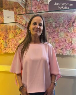 Blouse lichtroze vleermuismouwen